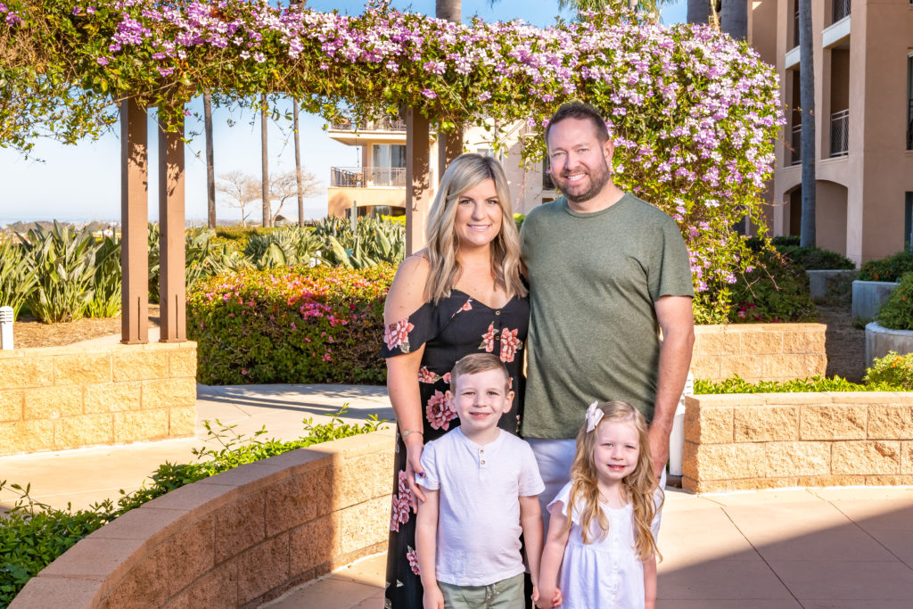 Shannon Phillips and her family standing in the courtyard of GPP