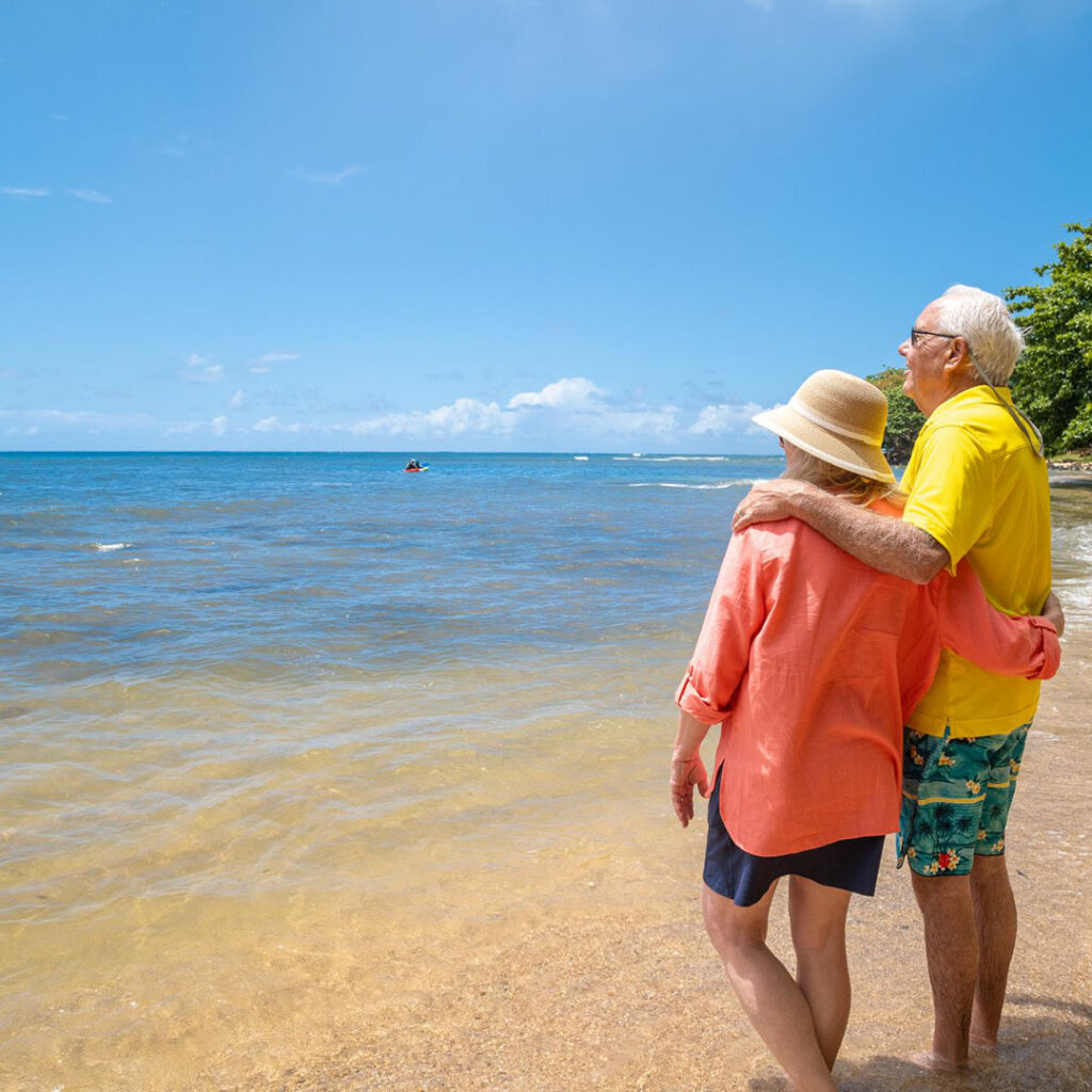 couple standing on hawaii beach